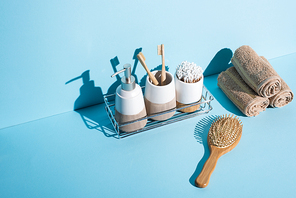 Top view of different hygiene and beauty items on white background, zero waste concept