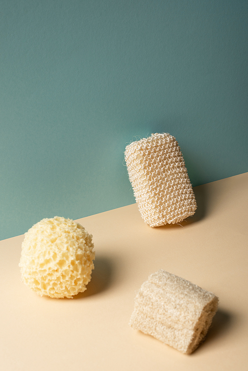 Sponges on beige and grey, zero waste concept