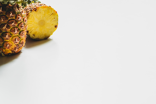 fresh cut delicious pineapples on white background