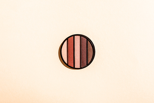 top view of eye shadow palette isolated on pink