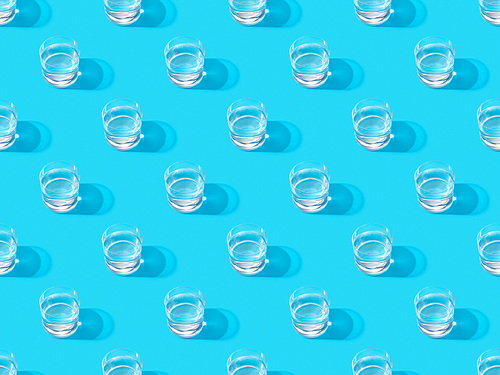 glasses of water on blue, seamless background pattern