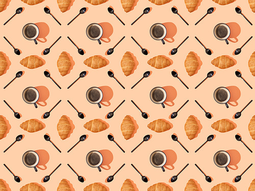 top view of spoons, fresh croissants and coffee on orange, seamless background pattern