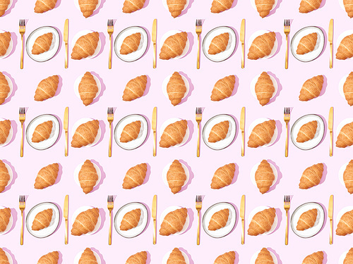 top view of cutlery and croissants on plates on pink, seamless background pattern