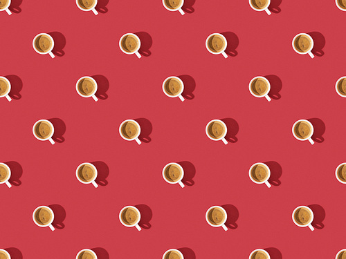 top view of cups of fresh coffee on red, seamless background pattern