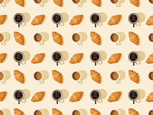 top view of croissants and coffee on beige, seamless background pattern