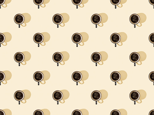 top view of cups of fresh coffee on beige, seamless background pattern