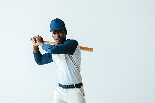 handsome african american sportsman playing baseball isolated on grey