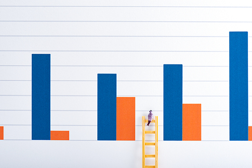 People figure on ladder near blue and red graphs at background, equality concept