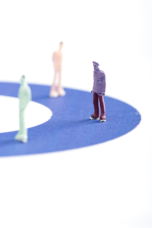 Selective focus of people figures on blue diagram isolated on white, concept of inequality