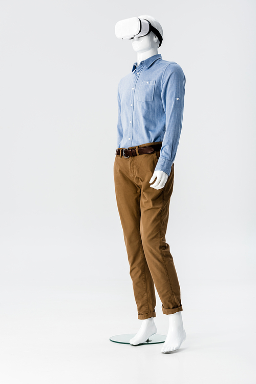 mannequin in clothes with Virtual reality headset isolated on grey