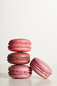 delicious red french macaroons on white background
