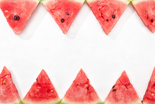 frame with delicious juicy watermelon slices on white background