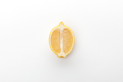 Top view of lemon half on white background