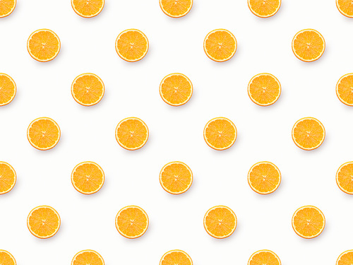Top view of orange slices on white background