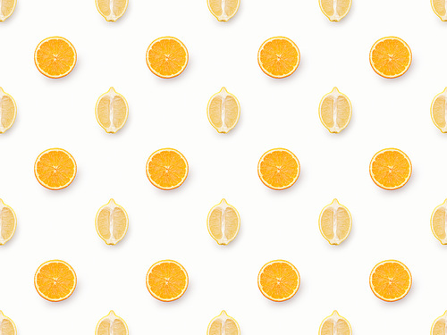 Top view of orange slices and lemons halves on white background