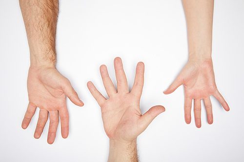 top view of three people showing palms isolated on white