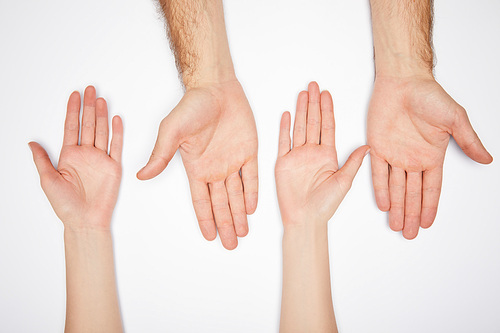 top view of man and woman showing palms isolated on white