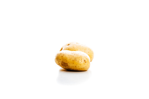 raw whole fresh potatoes isolated on white