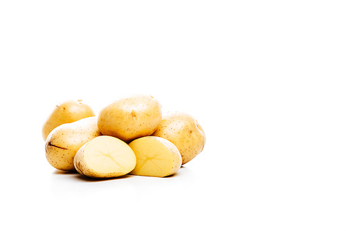 raw whole and cut fresh potatoes isolated on white