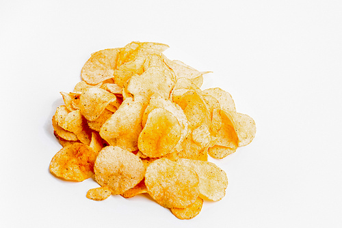 heap of fresh crunchy potato chips on white background