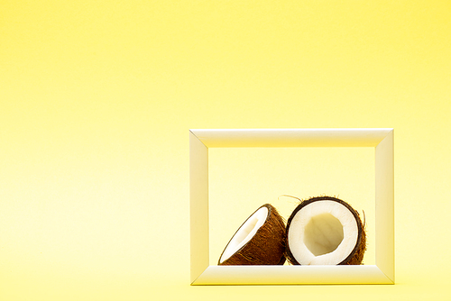 delicious sweet coconut and square frame on yellow background