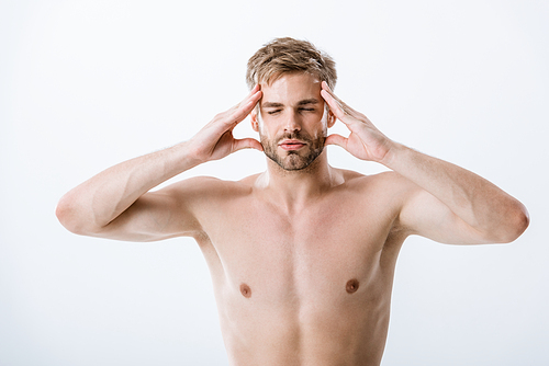 front view of shirtless man with migraine touching temples isolated on grey
