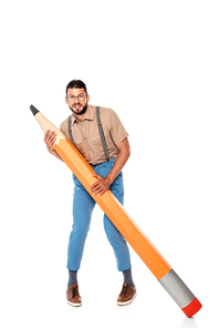 Handsome nerd in suspenders holding huge pencil on white background