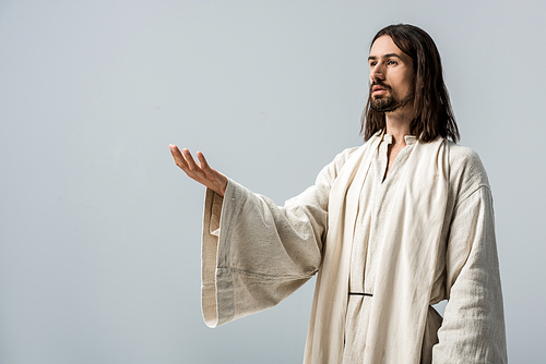 bearded religious man with outstretched hand isolated on grey