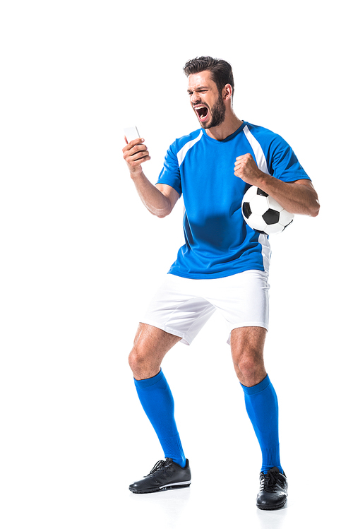 excited soccer player with ball using smartphone Isolated On White
