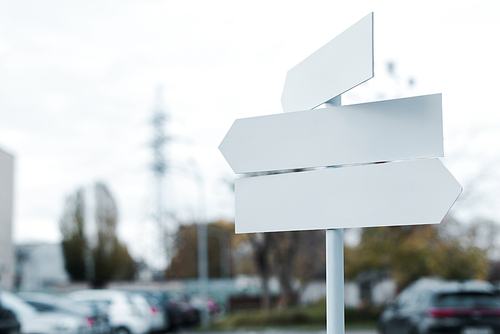 white and empty directional arrows on street