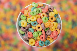 selective focus of bright colorful breakfast cereal in bowl