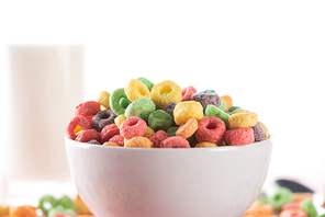 selective focus of bright multicolored breakfast cereal in bowl