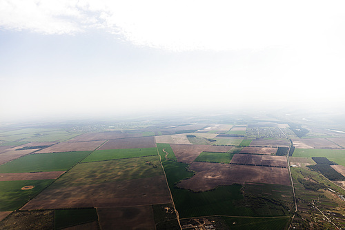 aerial view of fields under clouds in rome, italy