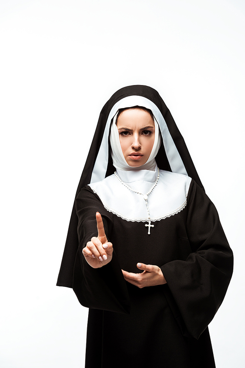serious nun in black clothing showing warning sign, isolated on white