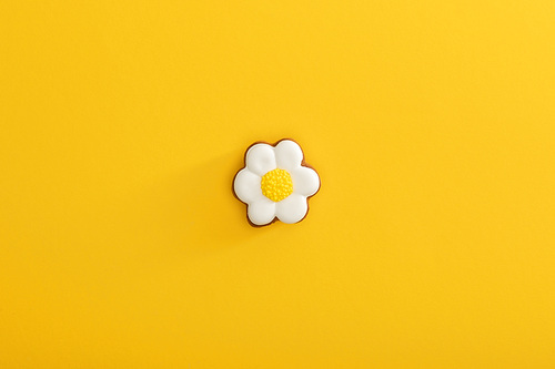 top view of delicious . cookie on yellow background