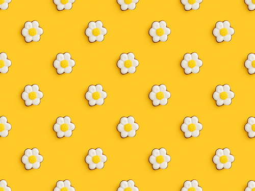 top view of delicious . cookies isolated on yellow background, seamless pattern