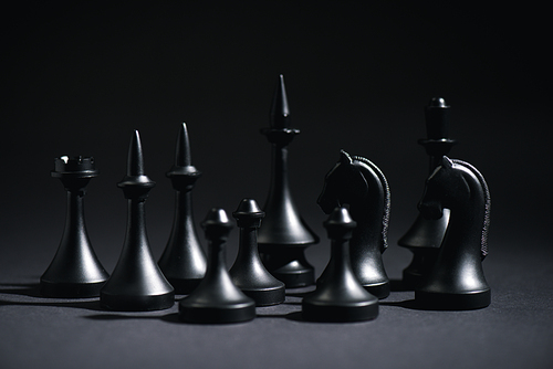 selective focus of chess figures on black