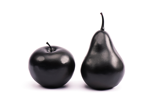 black pear and apple on white with copy space