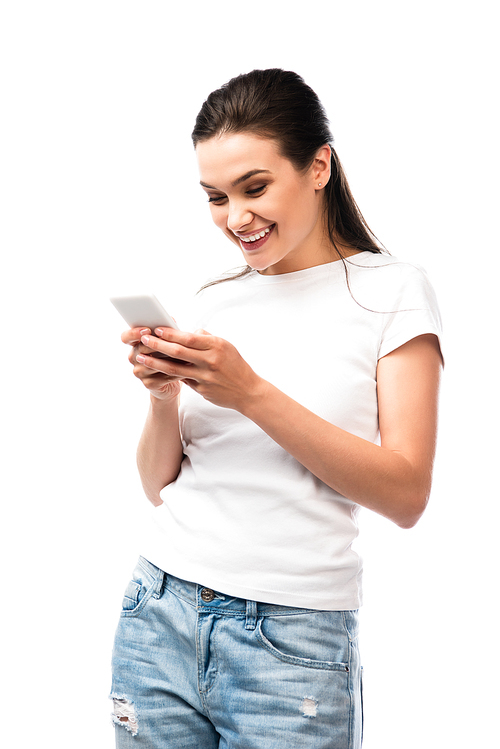 brunette woman in white t-shirt using smartphone isolated on white