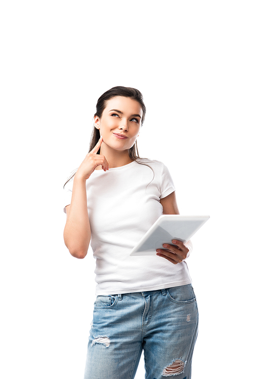 pensive brunette woman in white t-shirt holding digital tablet isolated on white