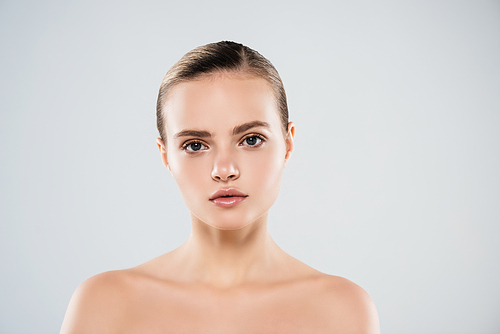 naked young woman  isolated on grey