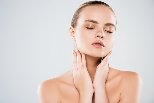 naked woman with closed eyes touching neck isolated on grey