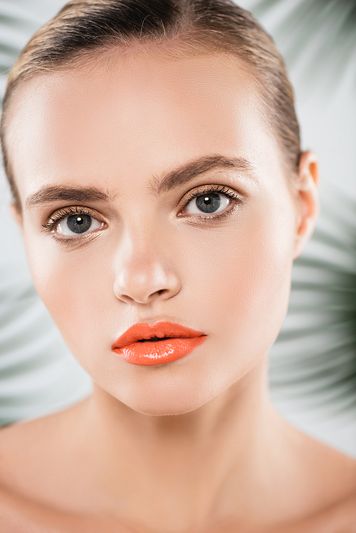 close up of attractive woman with makeup  on white