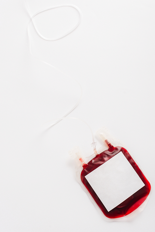 top view of blood donation package with blank label on white background
