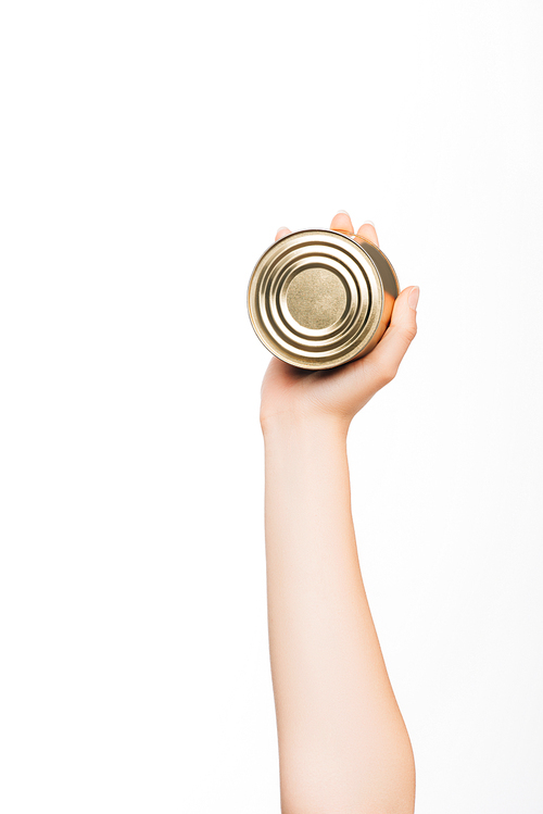 cropped view of woman holding canned beans isolated on white, charity concept