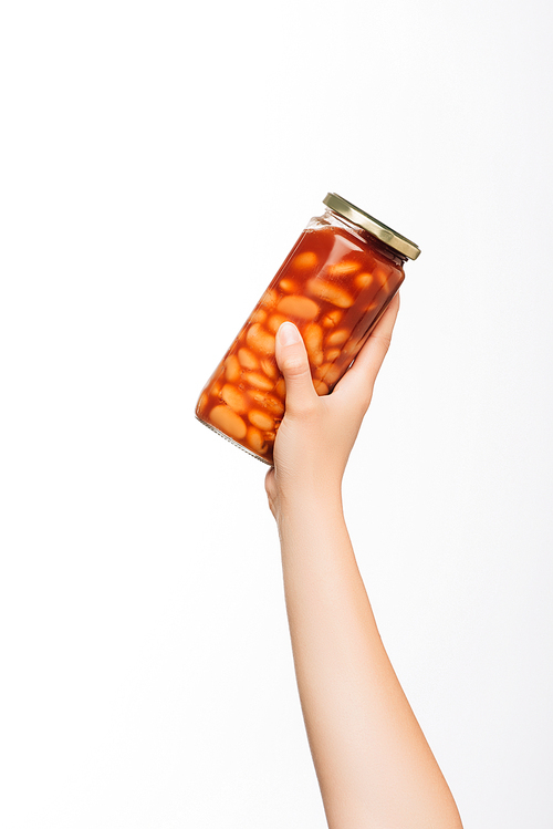 cropped view of woman holding canned beans isolated on white, charity concept