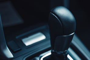 close up view of gear shifter in modern car