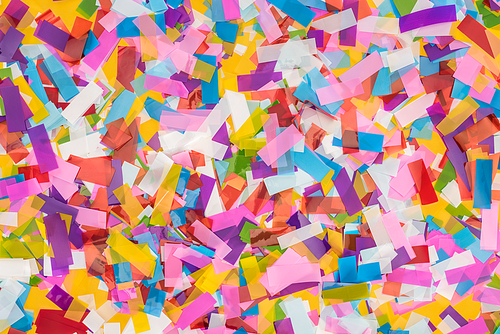 Close up view of multicolored confetti background