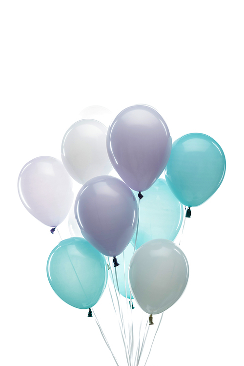 festive colorful blue, purple and white balloons isolated on white
