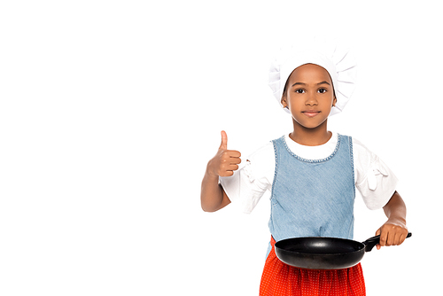 African american kid in costume of chef showing thumb up while holding frying pan isolated on white